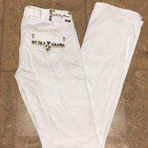 Women’s Guess White Starlet Pants with rivets.